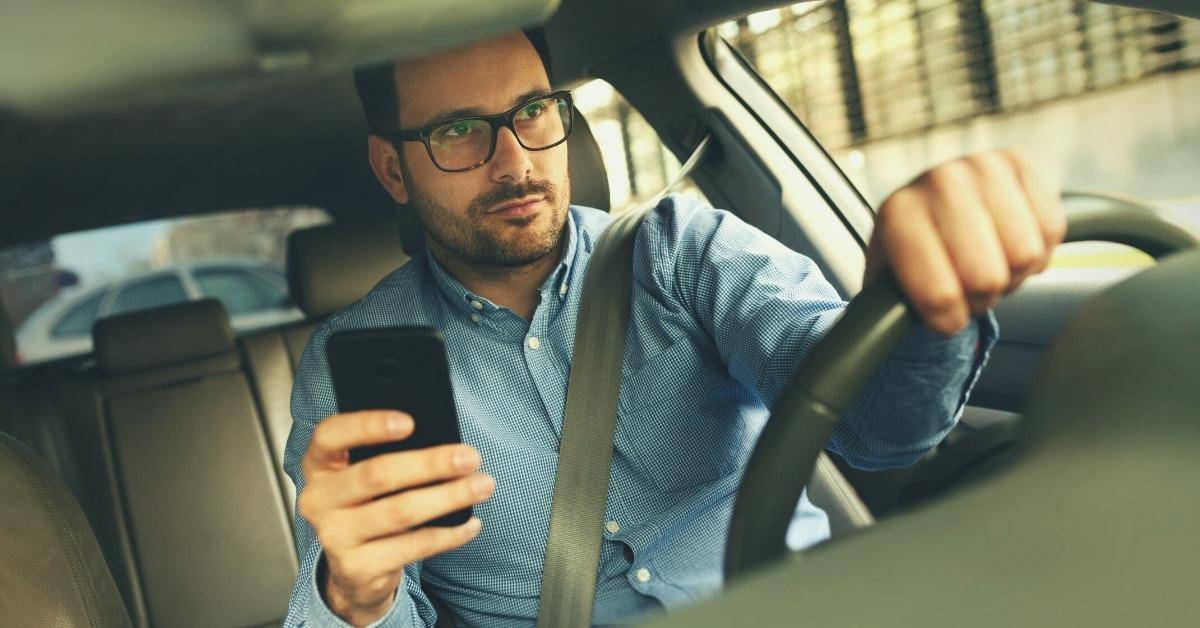 Driver using cell phone while operating vehicle