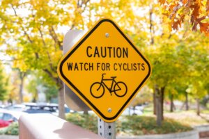 Sign reading: Caution, Watch for Cyclists