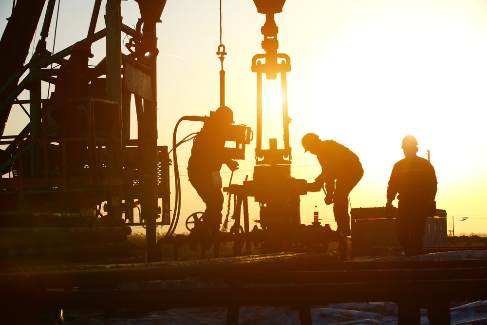 Oilfield workers drilling exploratory well