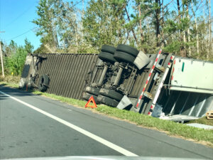 Tipover truck accident on side of interstate